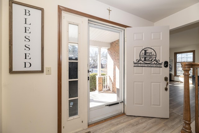 foyer entrance with a healthy amount of sunlight and light wood-type flooring