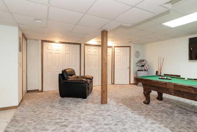 game room featuring a paneled ceiling, baseboards, light colored carpet, and pool table