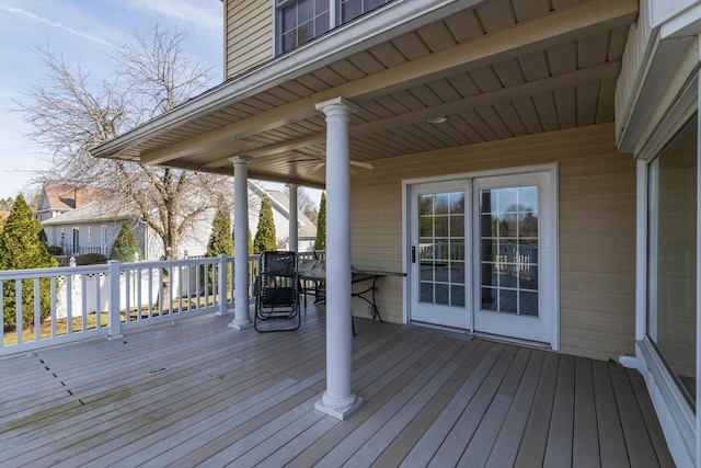 wooden terrace featuring outdoor dining space