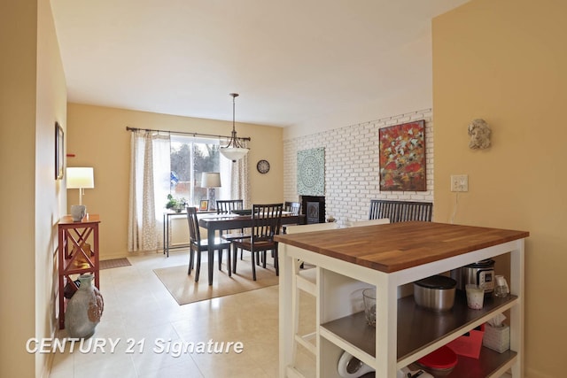 dining space with a fireplace