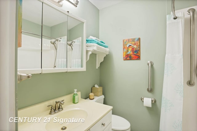 bathroom featuring vanity, a shower with shower curtain, and toilet