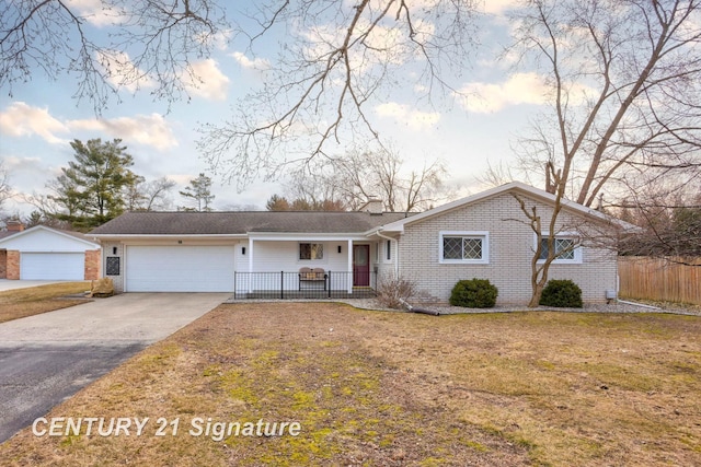 ranch-style home with fence, driveway, a chimney, a garage, and brick siding