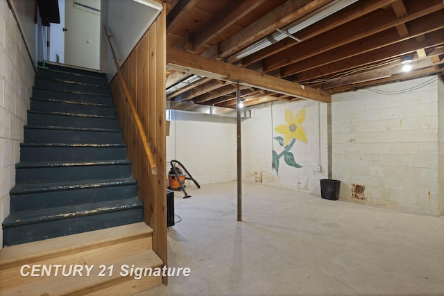 unfinished basement with stairway