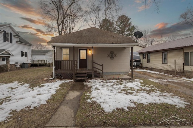 bungalow-style house with covered porch