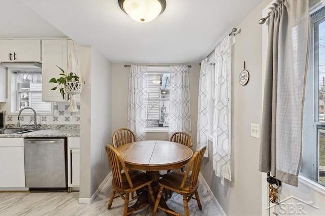 dining room with baseboards