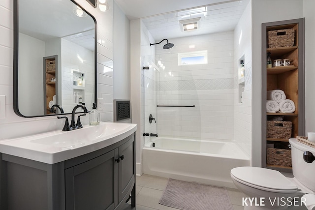 full bath with vanity, tile patterned floors, toilet, and shower / bathing tub combination