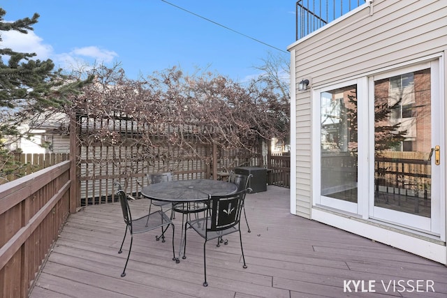 deck featuring outdoor dining area