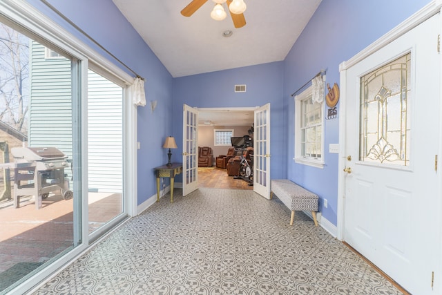 entrance foyer featuring french doors, visible vents, and a wealth of natural light