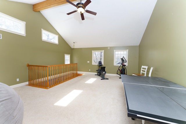 workout room featuring ceiling fan, carpet, baseboards, and high vaulted ceiling