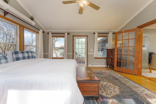 bedroom featuring access to exterior, vaulted ceiling, ornamental molding, baseboard heating, and wood finished floors