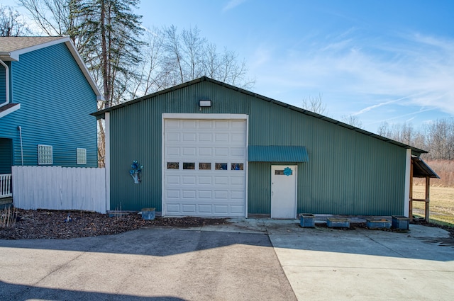 detached garage with fence