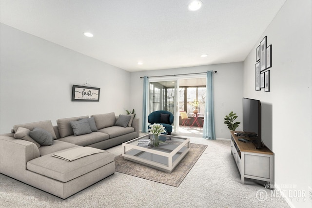 living area featuring recessed lighting, baseboards, and carpet floors