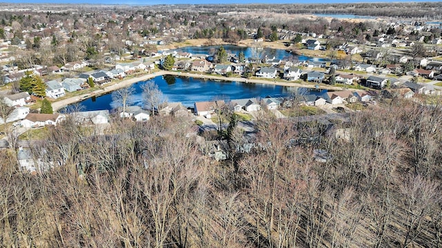 drone / aerial view with a residential view and a water view