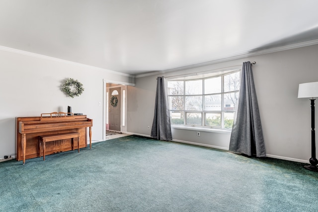 carpeted empty room with crown molding and baseboards