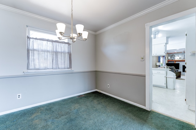 carpeted empty room with visible vents, baseboards, a chandelier, and crown molding