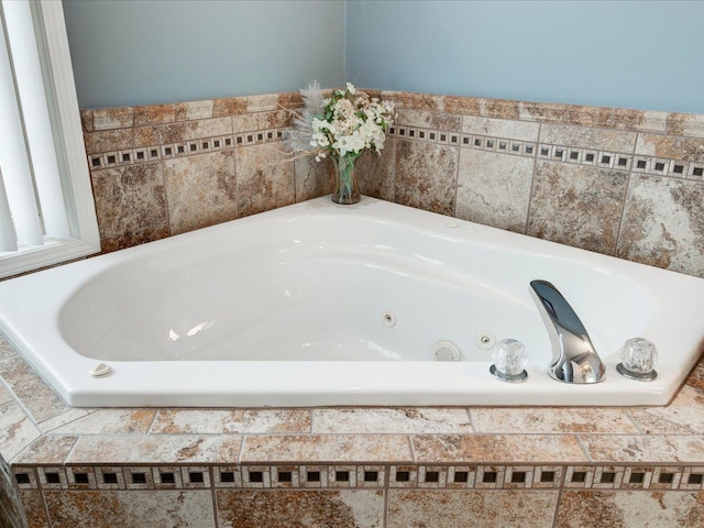 bathroom featuring a whirlpool tub