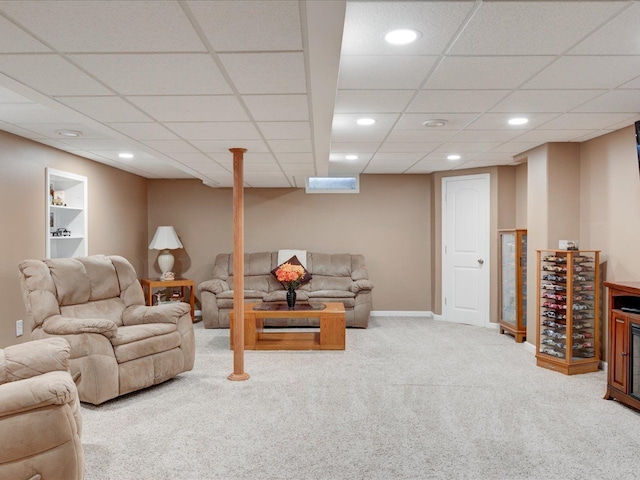 carpeted living room with recessed lighting and baseboards