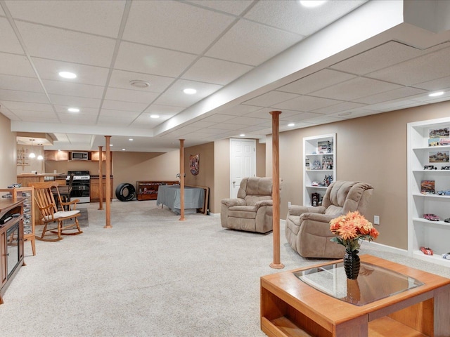 carpeted living room with bar area, built in features, recessed lighting, and baseboards