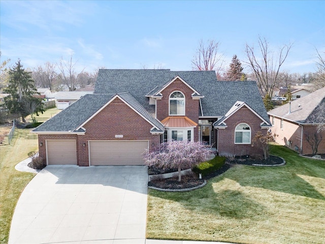 traditional-style home with a garage, brick siding, a front lawn, and a shingled roof