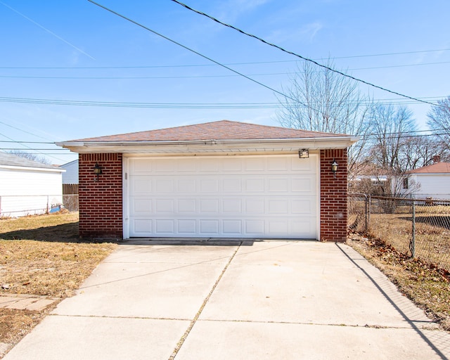 detached garage with fence