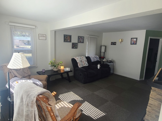 living room featuring baseboards