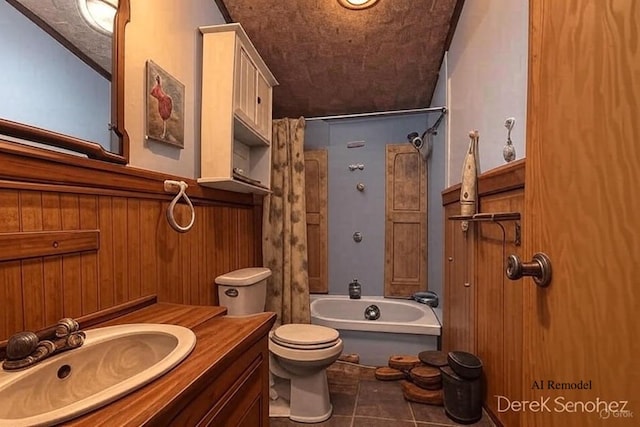 1872 E Shane Dr, Bitely, MI 49309 - bathroom with vanity, shower / bath combo, wainscoting, and tile patterned floors