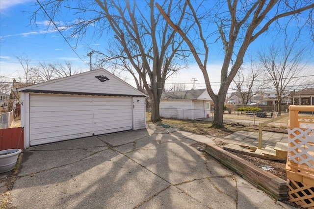 detached garage with fence