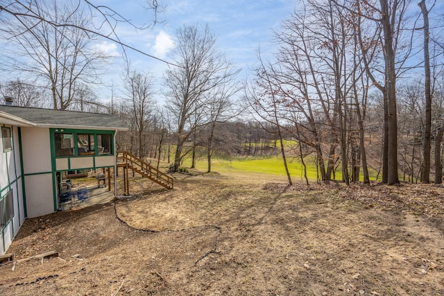 view of yard featuring stairway