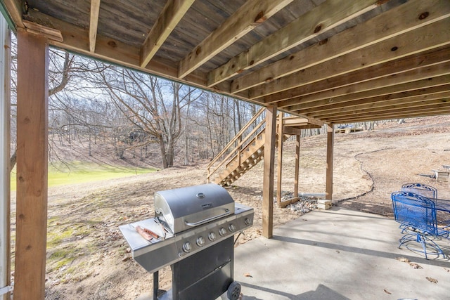 view of patio / terrace with grilling area and stairs