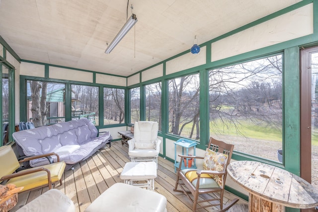 sunroom featuring a healthy amount of sunlight