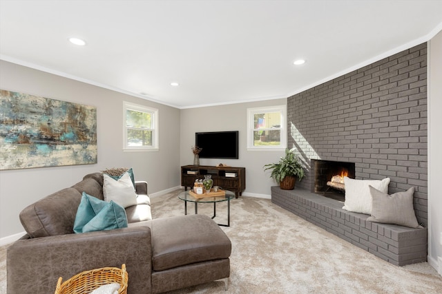 carpeted living room with recessed lighting, a fireplace, crown molding, and baseboards