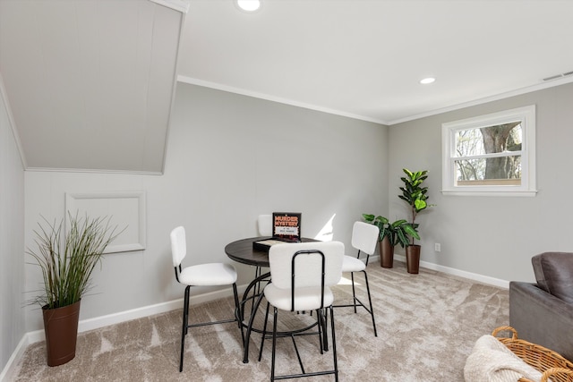 dining space featuring visible vents, baseboards, and light colored carpet