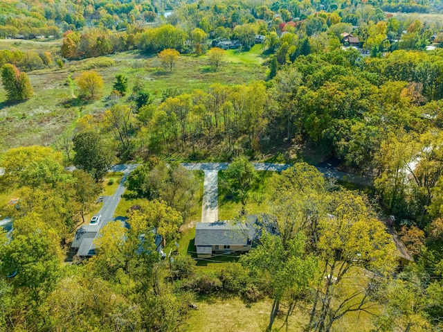 bird's eye view featuring a view of trees