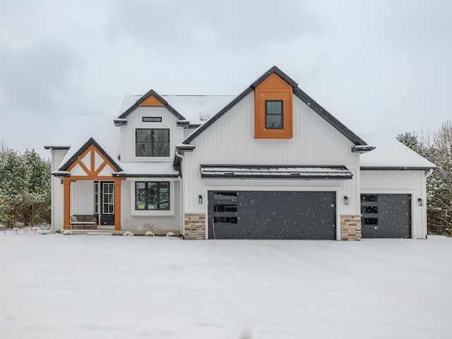 modern farmhouse featuring stone siding