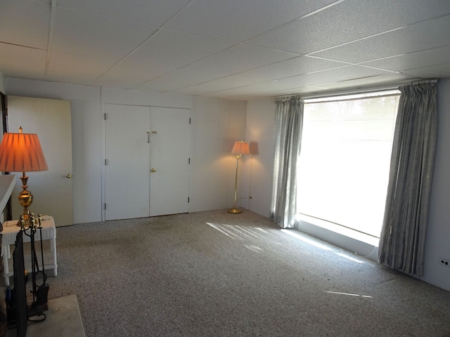 interior space featuring a paneled ceiling