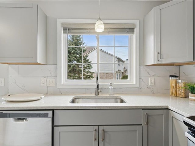 kitchen featuring range with electric cooktop, a sink, decorative light fixtures, decorative backsplash, and dishwasher