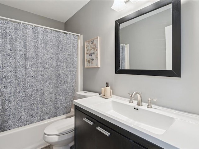 full bath featuring vanity, toilet, and shower / bath combo with shower curtain