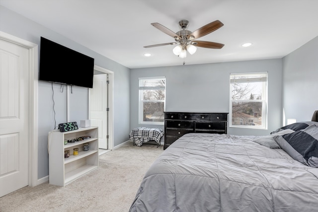 bedroom featuring carpet flooring, baseboards, and ceiling fan