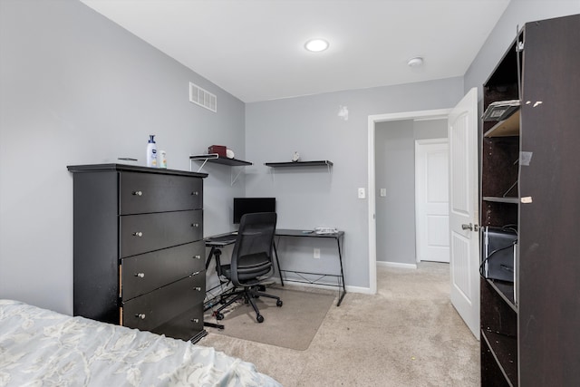 bedroom with visible vents, baseboards, and carpet