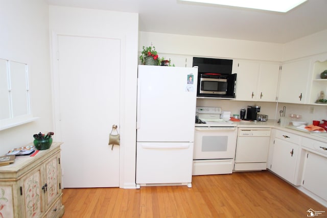 kitchen featuring open shelves, white appliances, light wood-style floors, and light countertops