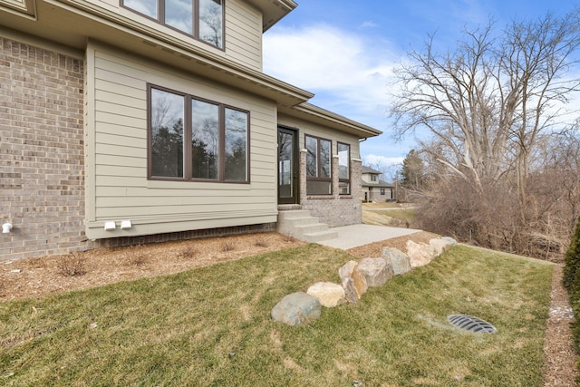 view of yard featuring entry steps