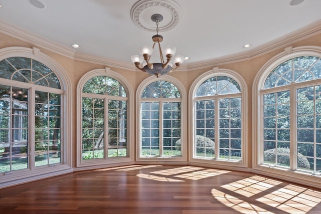 unfurnished sunroom featuring a notable chandelier