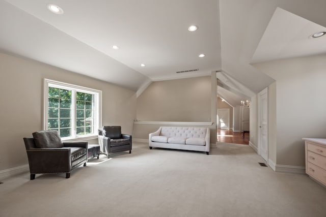 bedroom with recessed lighting, visible vents, lofted ceiling, and light carpet