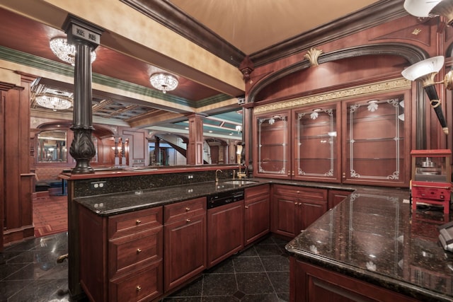 bar featuring granite finish floor, a sink, ornate columns, and ornamental molding