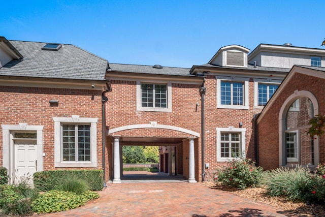 view of front of property featuring brick siding