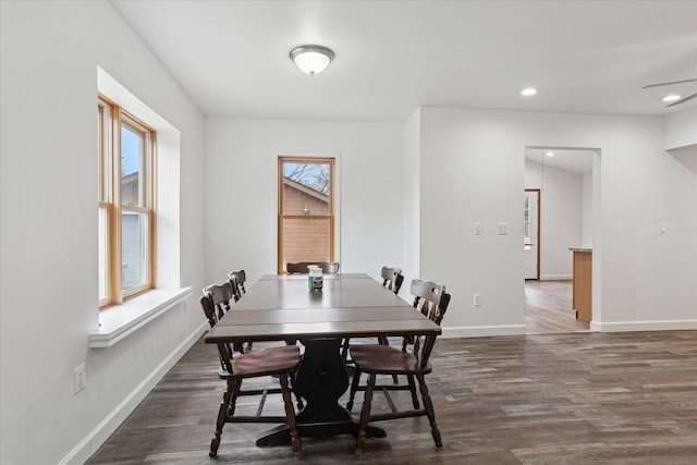 dining room with a wealth of natural light, baseboards, recessed lighting, and dark wood-style flooring