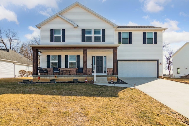 view of front of property featuring brick siding, a front yard, a porch, and driveway