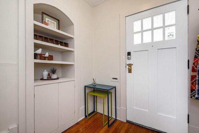 entryway with wood finished floors