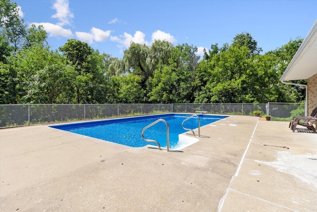 view of pool with a fenced in pool, a patio, and fence