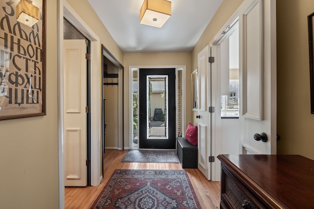 entrance foyer with light wood finished floors